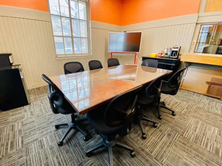 meeting room with table and chairs